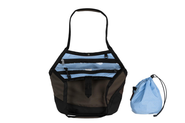 A Swift in Ursa Ballistic with Tidal (light blue with white grid) 200 Halcyon interior and Yarn Stuff Sack.